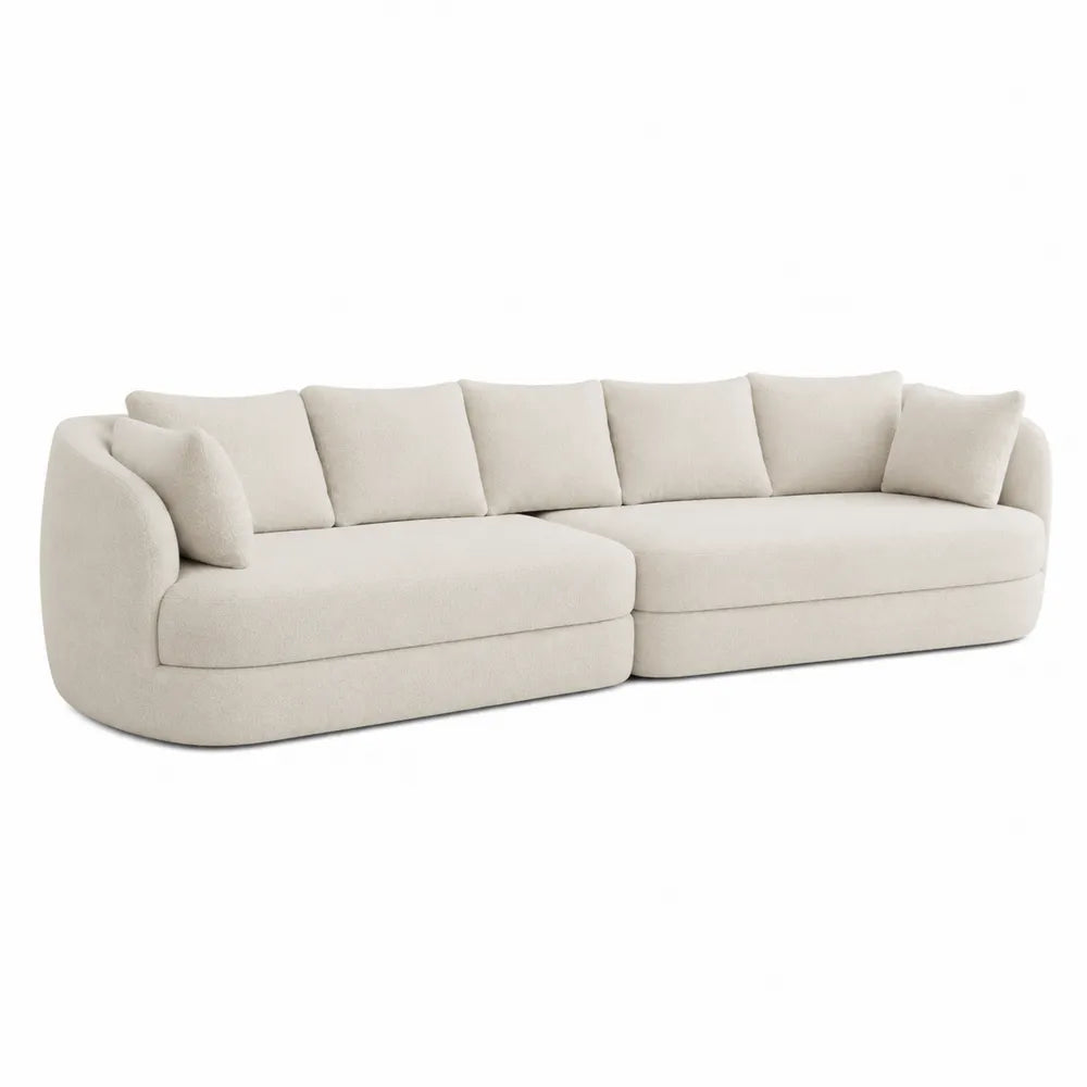 Divano angolare in tessuto beige con cuscini sfoderabili